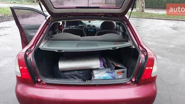 Червоний Деу Нубіра, об'ємом двигуна 1.6 л та пробігом 201 тис. км за 1650 $, фото 12 на Automoto.ua