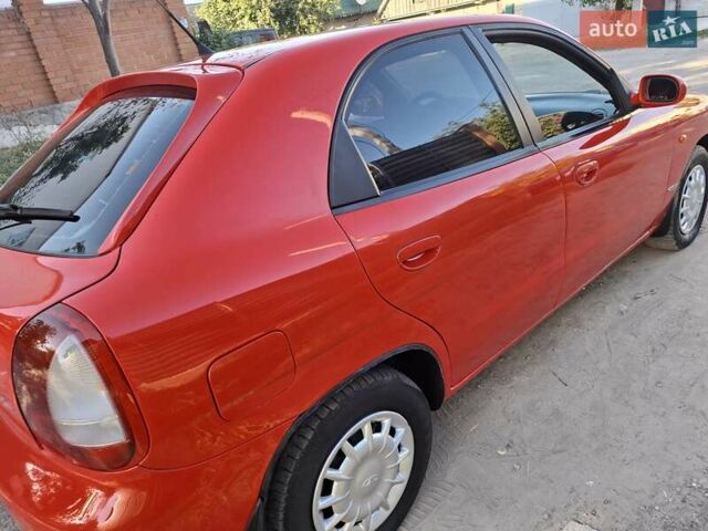 Червоний Деу Нубіра, об'ємом двигуна 0 л та пробігом 183 тис. км за 2750 $, фото 24 на Automoto.ua