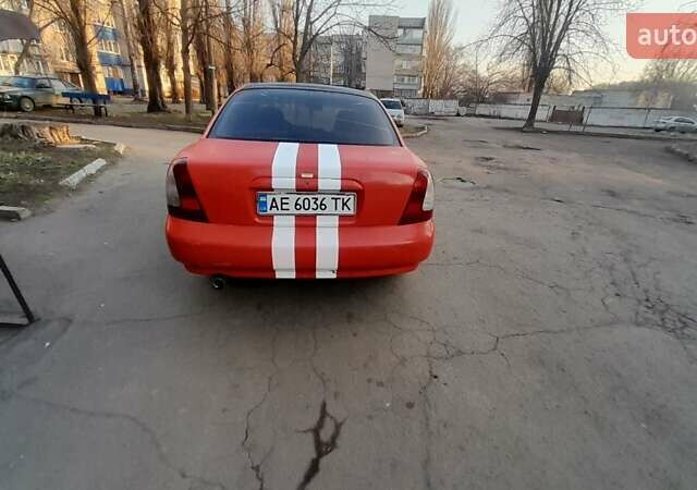 Красный Дэу Нубира, объемом двигателя 1.6 л и пробегом 333 тыс. км за 1500 $, фото 2 на Automoto.ua