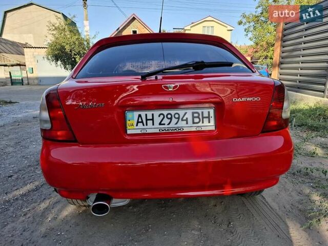 Червоний Деу Нубіра, об'ємом двигуна 0 л та пробігом 183 тис. км за 2750 $, фото 6 на Automoto.ua