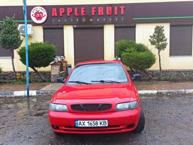 Деу Нубіра 1998 у Люботине на Automoto.ua Червоний Деу Нубіра, об'ємом двигуна 1.6 л та пробігом 225 тис. км за 1800 $, фото 3 на Automoto.ua