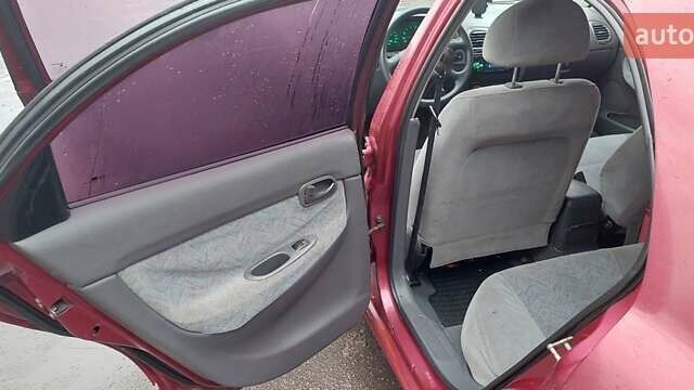 Червоний Деу Нубіра, об'ємом двигуна 1.6 л та пробігом 201 тис. км за 1650 $, фото 9 на Automoto.ua