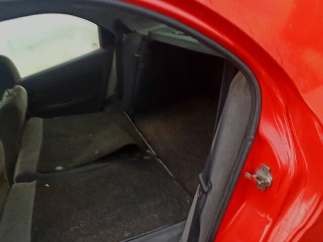 Деу Нубіра 1998 у Люботине на Automoto.ua Червоний Деу Нубіра, об'ємом двигуна 1.6 л та пробігом 225 тис. км за 1800 $, фото 9 на Automoto.ua