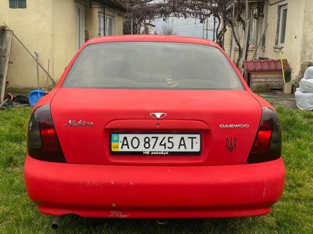 Красный Дэу Нубира, объемом двигателя 1.6 л и пробегом 180 тыс. км за 1050 $, фото 1 на Automoto.ua