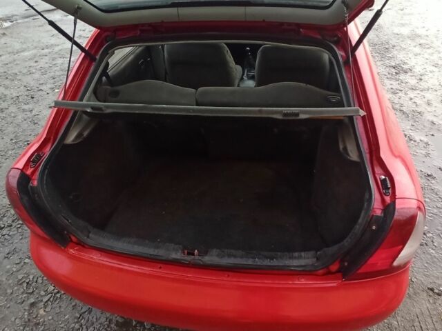 Деу Нубіра 1998 у Люботине на Automoto.ua Червоний Деу Нубіра, об'ємом двигуна 1.6 л та пробігом 225 тис. км за 1800 $, фото 13 на Automoto.ua