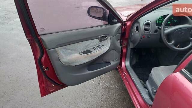 Червоний Деу Нубіра, об'ємом двигуна 1.6 л та пробігом 201 тис. км за 1650 $, фото 7 на Automoto.ua