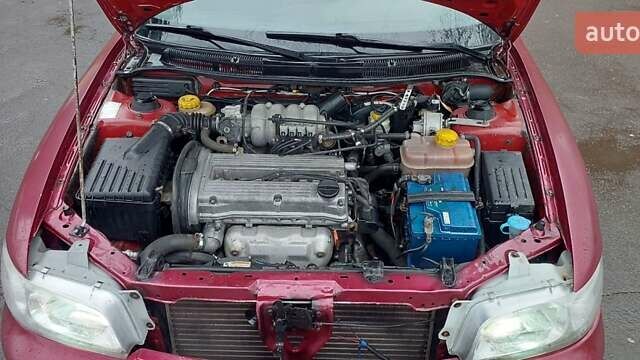 Червоний Деу Нубіра, об'ємом двигуна 1.6 л та пробігом 201 тис. км за 1650 $, фото 15 на Automoto.ua