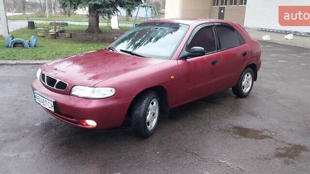 Червоний Деу Нубіра, об'ємом двигуна 1.6 л та пробігом 201 тис. км за 1650 $, фото 5 на Automoto.ua