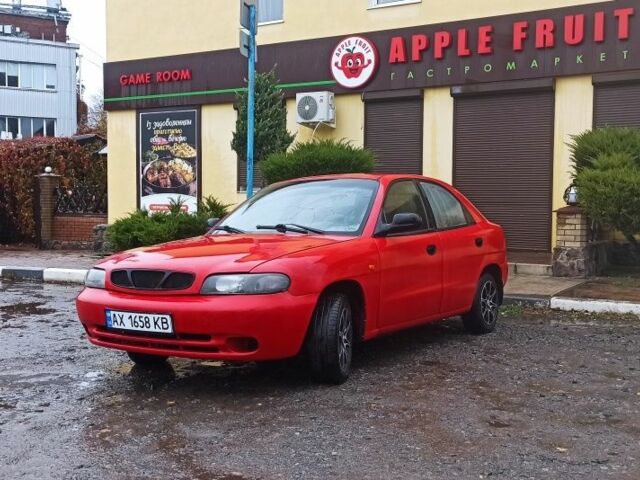 Деу Нубіра 1998 у Люботине на Automoto.ua Червоний Деу Нубіра, об'ємом двигуна 1.6 л та пробігом 225 тис. км за 1800 $, фото 16 на Automoto.ua