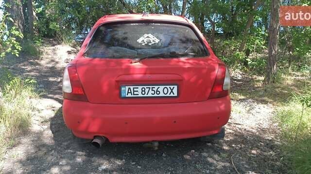 Красный Дэу Нубира, объемом двигателя 2 л и пробегом 313 тыс. км за 1700 $, фото 1 на Automoto.ua