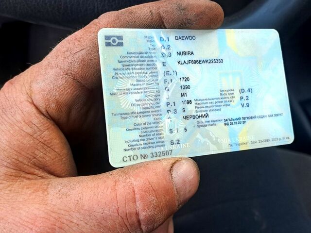 Красный Дэу Нубира, объемом двигателя 1.6 л и пробегом 580 тыс. км за 1100 $, фото 5 на Automoto.ua