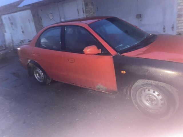 Червоний Деу Нубіра, об'ємом двигуна 1.6 л та пробігом 270 тис. км за 1100 $, фото 3 на Automoto.ua