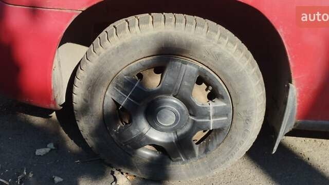 Красный Дэу Нубира, объемом двигателя 1.6 л и пробегом 346 тыс. км за 1500 $, фото 4 на Automoto.ua