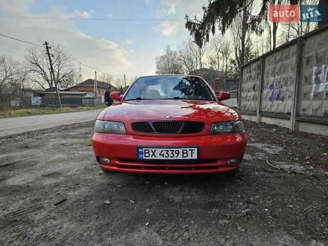 Красный Дэу Нубира, объемом двигателя 1.6 л и пробегом 300 тыс. км за 3000 $, фото 5 на Automoto.ua