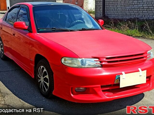 Красный Дэу Нубира, объемом двигателя 1.6 л и пробегом 195 тыс. км за 3500 $, фото 1 на Automoto.ua