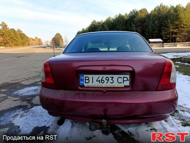 Червоний Деу Нубіра, об'ємом двигуна 1.6 л та пробігом 185 тис. км за 1350 $, фото 5 на Automoto.ua