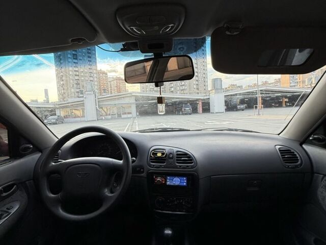 Красный Дэу Нубира, объемом двигателя 1.6 л и пробегом 234 тыс. км за 1650 $, фото 9 на Automoto.ua