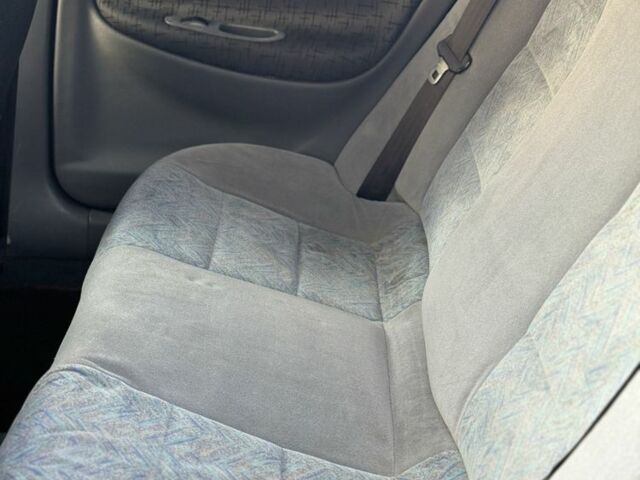 Красный Дэу Нубира, объемом двигателя 1.6 л и пробегом 234 тыс. км за 1650 $, фото 10 на Automoto.ua