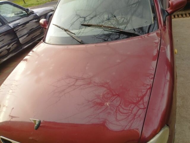 Красный Дэу Нубира, объемом двигателя 0 л и пробегом 450 тыс. км за 1200 $, фото 3 на Automoto.ua