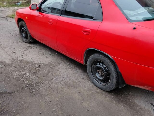 Червоний Деу Нубіра, об'ємом двигуна 1.6 л та пробігом 390 тис. км за 1939 $, фото 3 на Automoto.ua