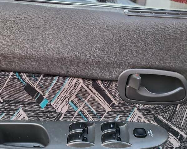 Червоний Деу Нубіра, об'ємом двигуна 1.6 л та пробігом 224 тис. км за 2850 $, фото 21 на Automoto.ua