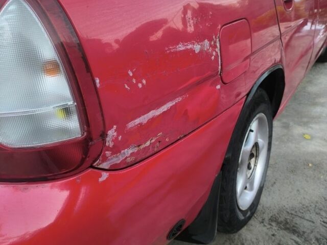 Красный Дэу Нубира, объемом двигателя 1.6 л и пробегом 330 тыс. км за 1100 $, фото 5 на Automoto.ua