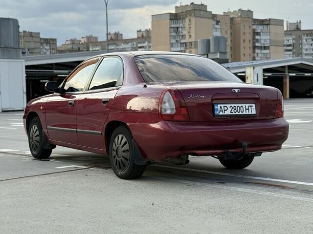 Красный Дэу Нубира, объемом двигателя 1.6 л и пробегом 234 тыс. км за 1650 $, фото 5 на Automoto.ua