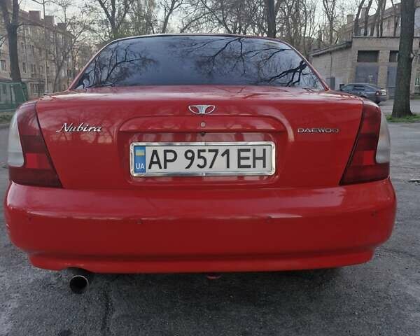 Червоний Деу Нубіра, об'ємом двигуна 1.6 л та пробігом 224 тис. км за 2850 $, фото 4 на Automoto.ua
