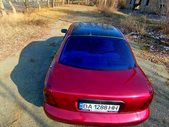 Красный Дэу Нубира, объемом двигателя 1.6 л и пробегом 123 тыс. км за 2250 $, фото 3 на Automoto.ua