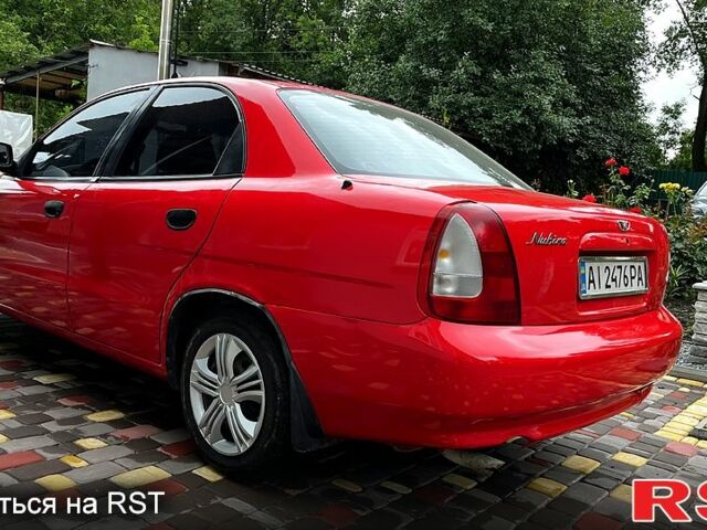 Червоний Деу Нубіра, об'ємом двигуна 1.6 л та пробігом 250 тис. км за 1299 $, фото 11 на Automoto.ua
