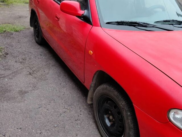 Червоний Деу Нубіра, об'ємом двигуна 1.6 л та пробігом 390 тис. км за 1939 $, фото 4 на Automoto.ua