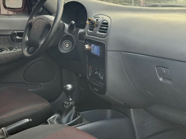 Красный Дэу Нубира, объемом двигателя 1.6 л и пробегом 234 тыс. км за 1650 $, фото 8 на Automoto.ua