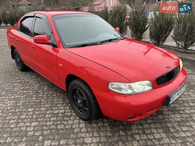 Червоний Деу Нубіра, об'ємом двигуна 1.6 л та пробігом 331 тис. км за 2350 $, фото 7 на Automoto.ua