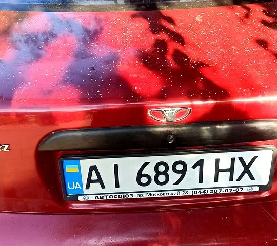 Червоний Деу Нубіра, об'ємом двигуна 1.6 л та пробігом 378 тис. км за 1100 $, фото 3 на Automoto.ua