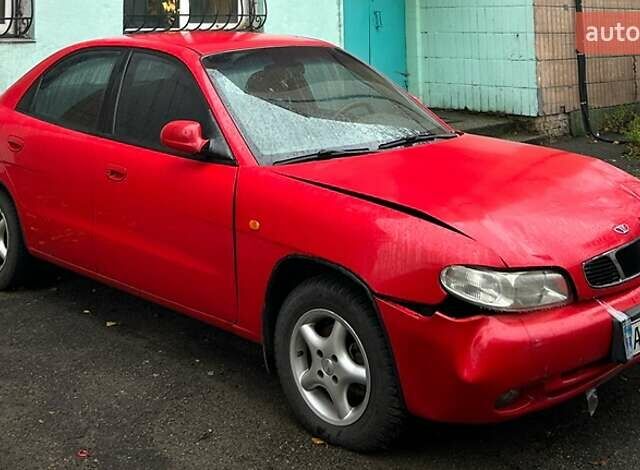 Червоний Деу Нубіра, об'ємом двигуна 1.6 л та пробігом 230 тис. км за 1100 $, фото 2 на Automoto.ua