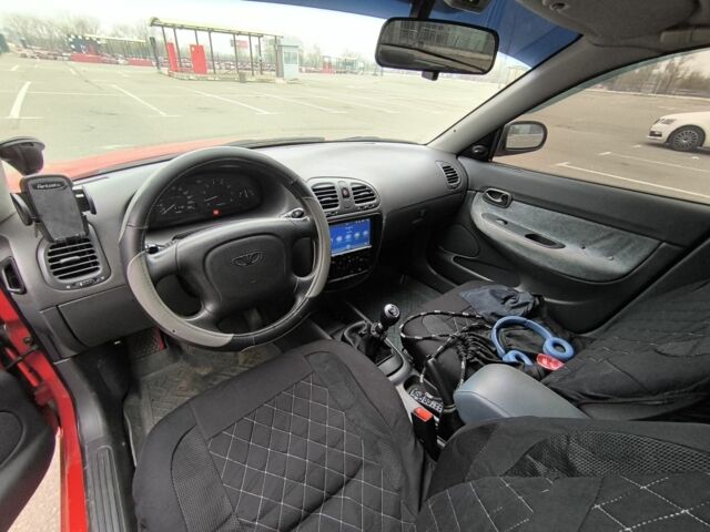 Красный Дэу Нубира, объемом двигателя 1.6 л и пробегом 136 тыс. км за 2700 $, фото 6 на Automoto.ua