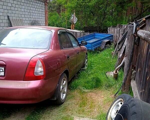 Красный Дэу Нубира, объемом двигателя 1.6 л и пробегом 465 тыс. км за 1700 $, фото 2 на Automoto.ua