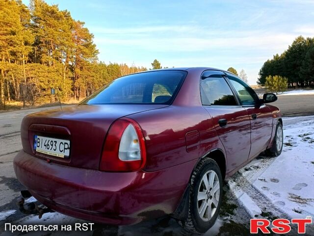 Червоний Деу Нубіра, об'ємом двигуна 1.6 л та пробігом 185 тис. км за 1350 $, фото 4 на Automoto.ua