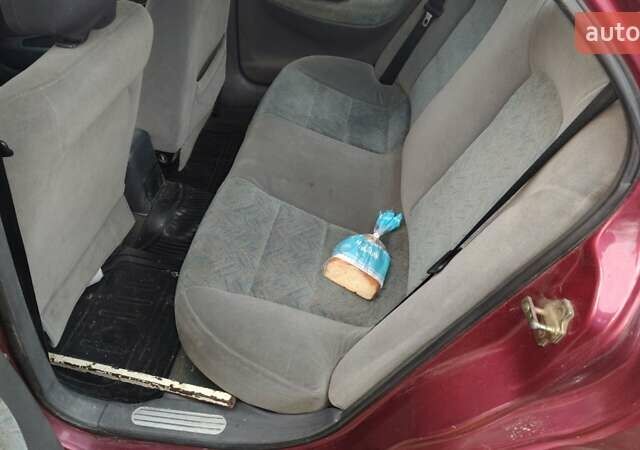 Червоний Деу Нубіра, об'ємом двигуна 1.6 л та пробігом 300 тис. км за 1200 $, фото 2 на Automoto.ua