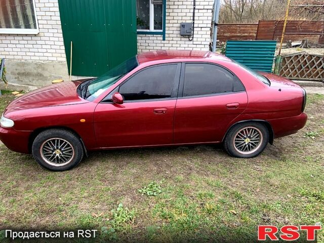 Красный Дэу Нубира, объемом двигателя 1.6 л и пробегом 0 тыс. км за 3000 $, фото 10 на Automoto.ua