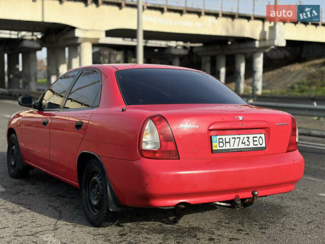 Червоний Деу Нубіра, об'ємом двигуна 1.6 л та пробігом 180 тис. км за 1750 $, фото 6 на Automoto.ua