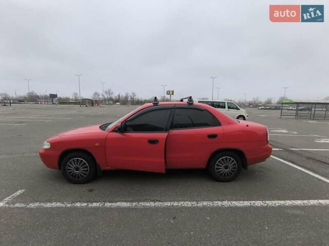 Червоний Деу Нубіра, об'ємом двигуна 1.6 л та пробігом 136 тис. км за 3000 $, фото 3 на Automoto.ua