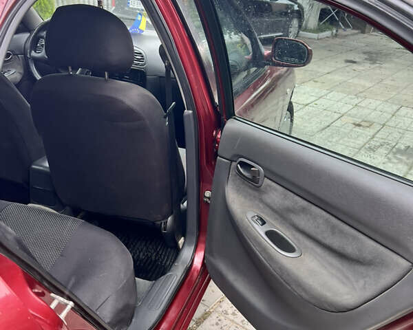 Червоний Деу Нубіра, об'ємом двигуна 1.6 л та пробігом 168 тис. км за 2200 $, фото 7 на Automoto.ua