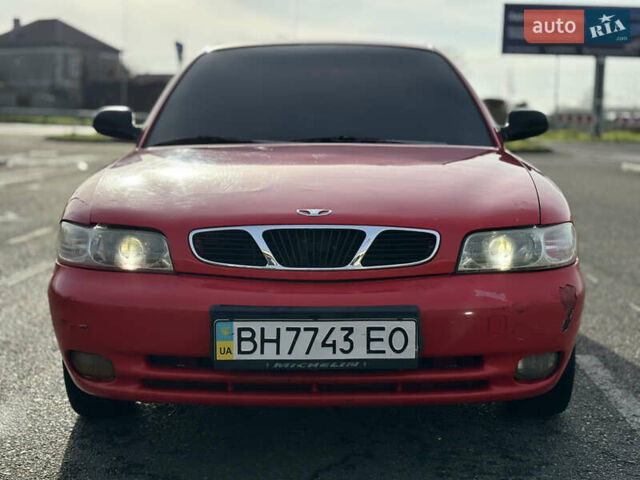 Червоний Деу Нубіра, об'ємом двигуна 1.6 л та пробігом 180 тис. км за 1750 $, фото 2 на Automoto.ua