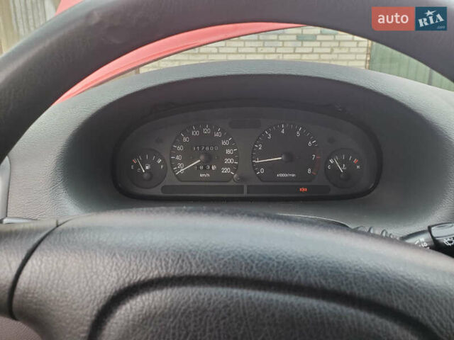 Красный Дэу Нубира, объемом двигателя 1.6 л и пробегом 300 тыс. км за 1400 $, фото 2 на Automoto.ua