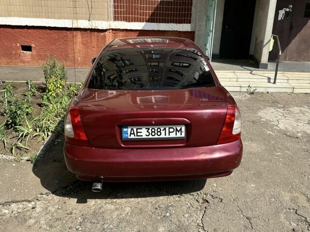 Красный Дэу Нубира, объемом двигателя 1.6 л и пробегом 284 тыс. км за 1600 $, фото 1 на Automoto.ua