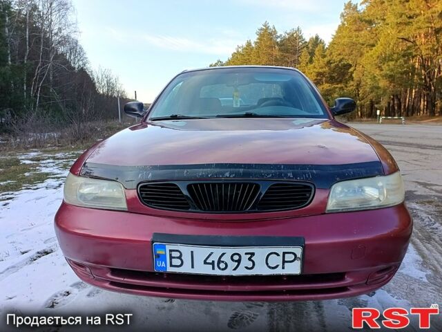 Червоний Деу Нубіра, об'ємом двигуна 1.6 л та пробігом 185 тис. км за 1350 $, фото 2 на Automoto.ua