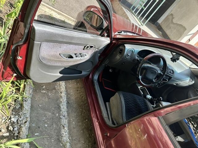 Красный Дэу Нубира, объемом двигателя 1.6 л и пробегом 284 тыс. км за 1600 $, фото 5 на Automoto.ua