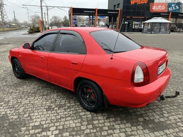 Червоний Деу Нубіра, об'ємом двигуна 1.6 л та пробігом 331 тис. км за 2350 $, фото 1 на Automoto.ua