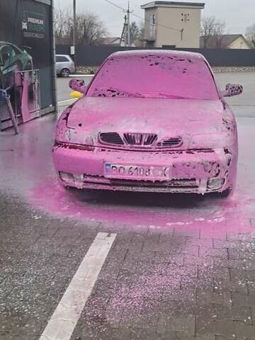 Красный Дэу Нубира, объемом двигателя 1.6 л и пробегом 200 тыс. км за 2655 $, фото 3 на Automoto.ua